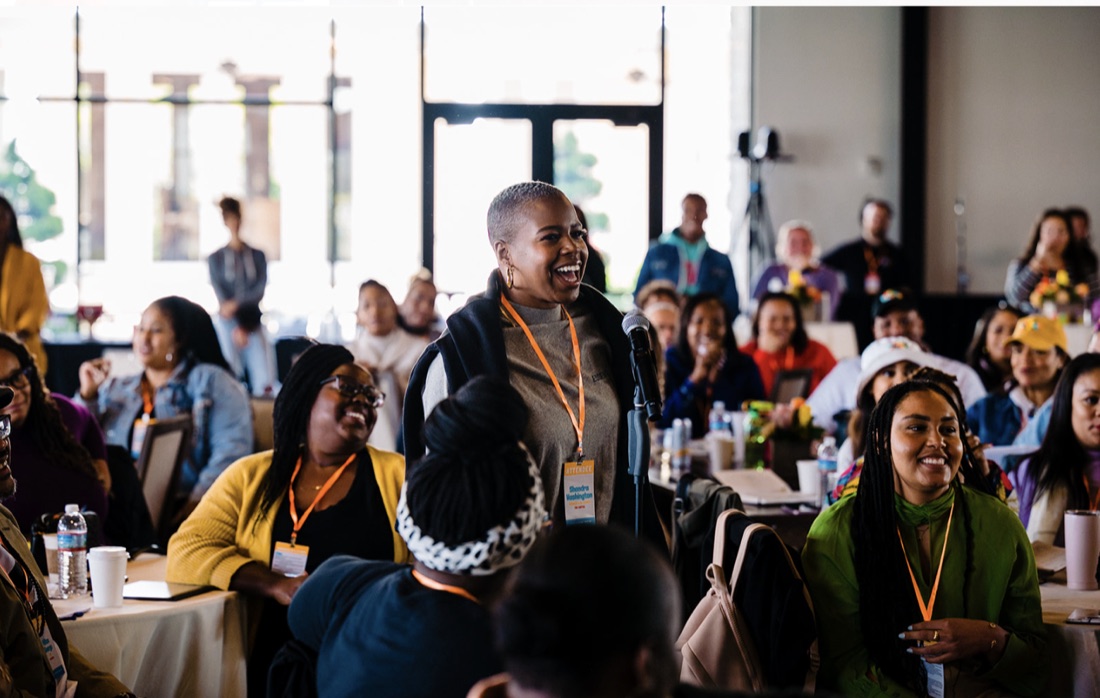 A CEO Spring Break attendee sharing at the mic